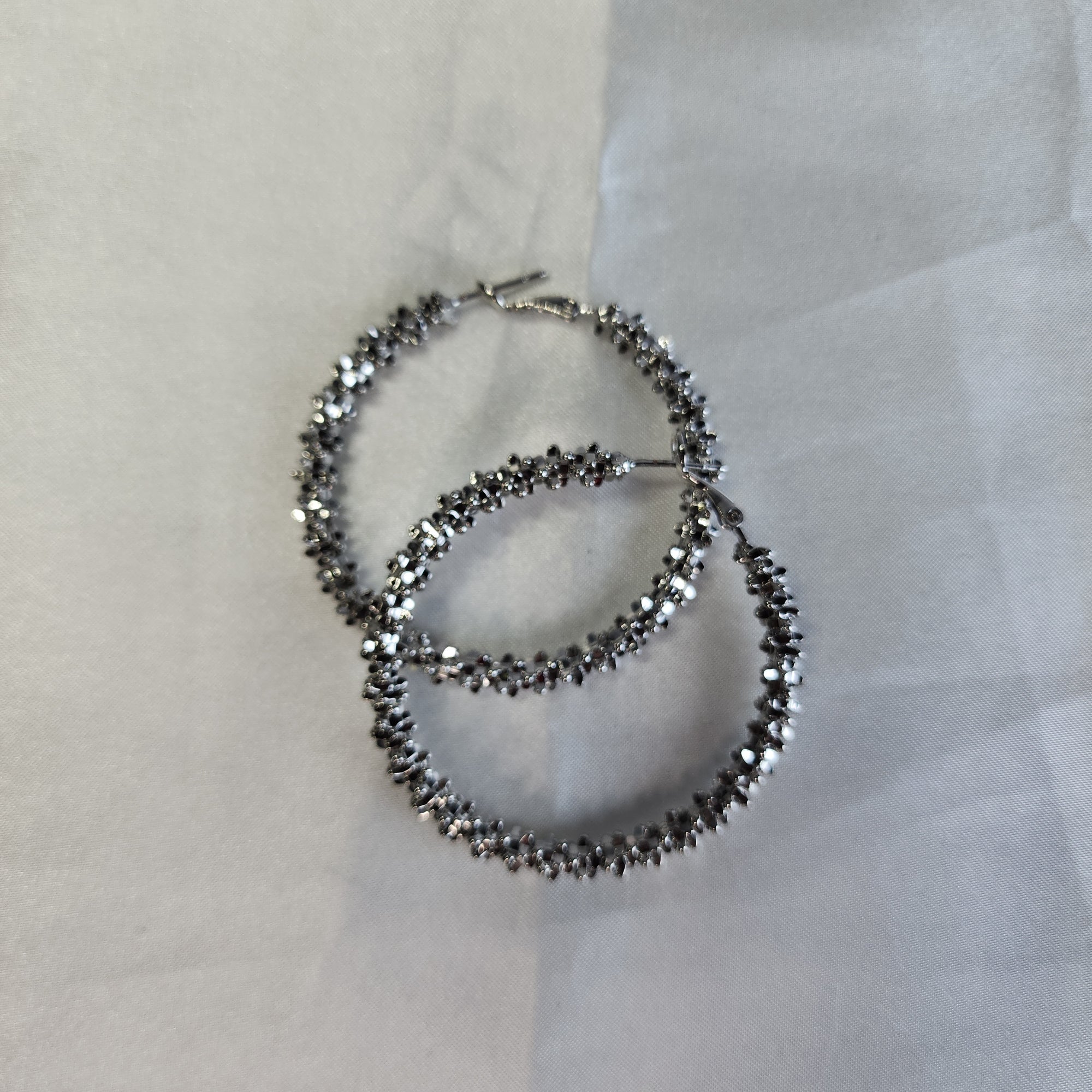 Silver spiked hoops