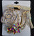 gold ab heel brooch