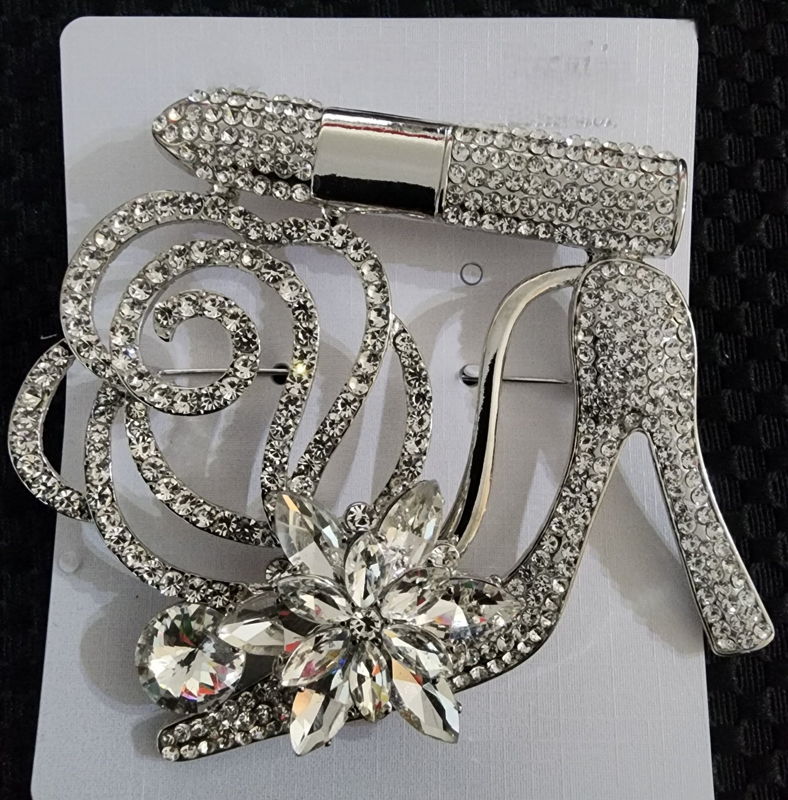silver heel brooch