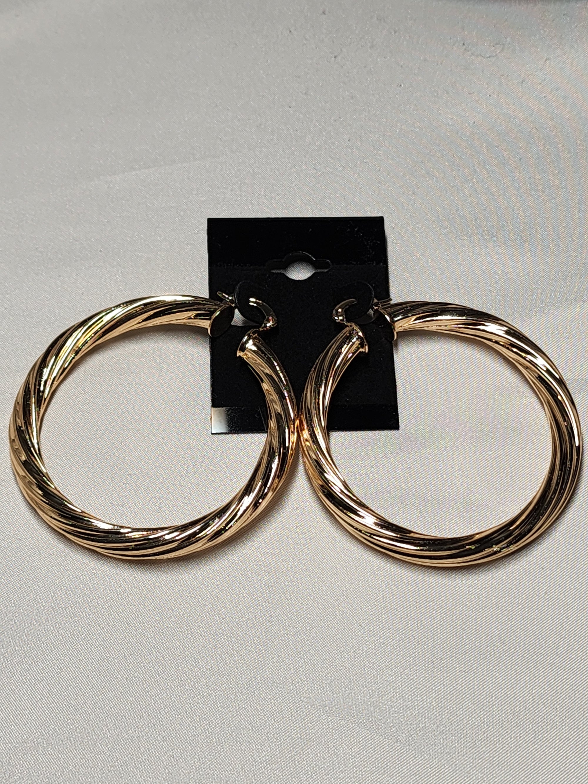 gold twisted hoops